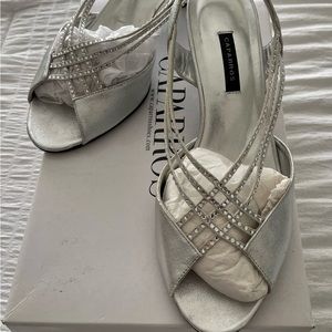 Silver low heeled dressy shoe for wedding etc. worn once.
